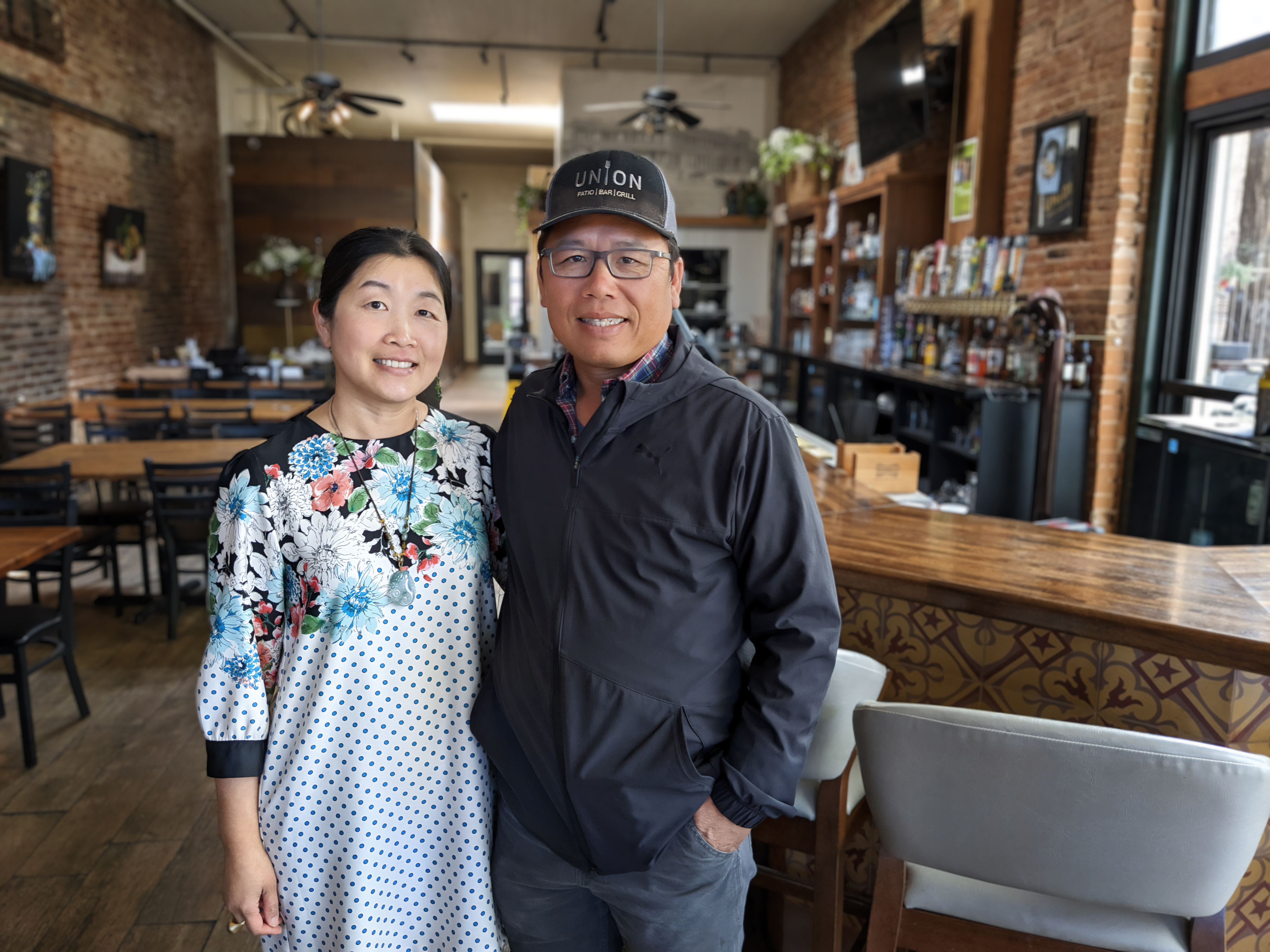 Brian and Louisa Wong standing in the Union Restaurant